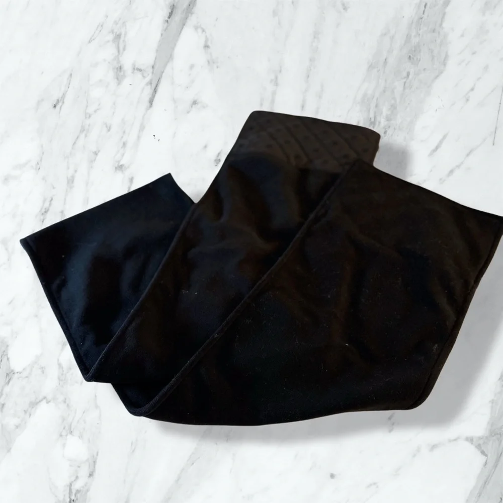 Eddie Bauer finely woven‎ fleece scarf in black with a quilted accent. 64” x 9”